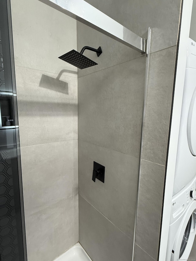 8 Hubbard Rd, North Branford, CT 06471 - bathroom with stacked washer / dryer and tiled shower