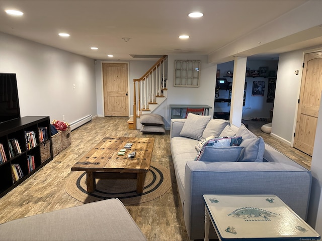 living area featuring stairs, wood finished floors, a baseboard heating unit, baseboards, and recessed lighting