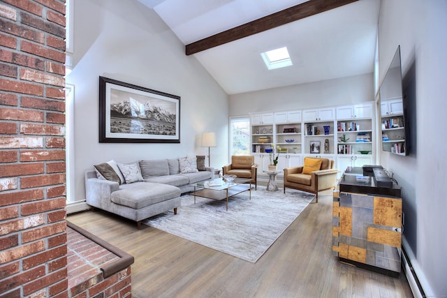 living area featuring high vaulted ceiling, baseboard heating, a skylight, wood finished floors, and beam ceiling