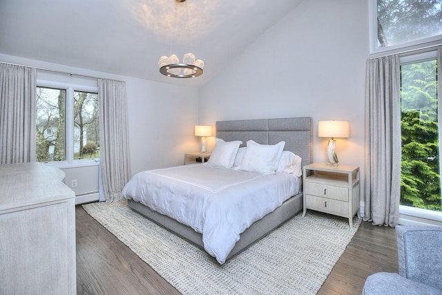 bedroom featuring high vaulted ceiling, an inviting chandelier, a baseboard heating unit, and wood finished floors