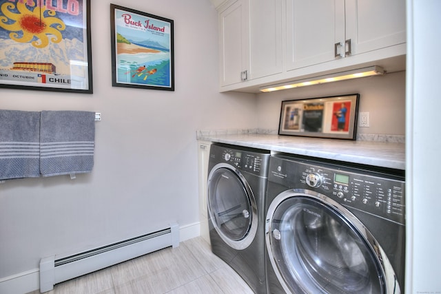 washroom with independent washer and dryer, a baseboard heating unit, baseboards, and cabinet space
