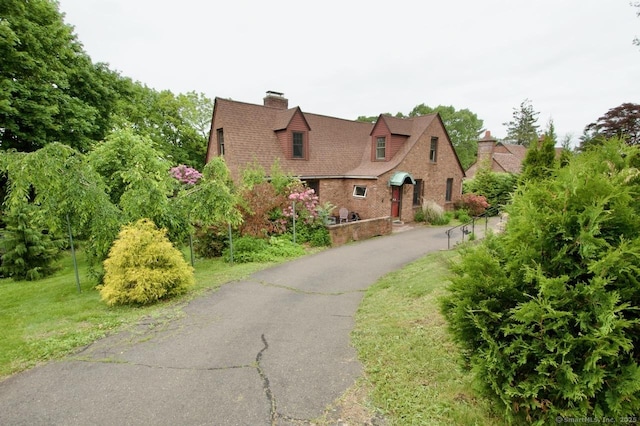 85 Hillcrest Ter, Meriden, CT 06450 - english style home with a chimney and a front yard