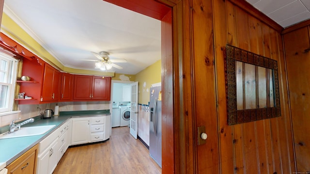 85 Hillcrest Ter, Meriden, CT 06450 - kitchen with a sink, independent washer and dryer, a ceiling fan, stainless steel fridge, and open shelves