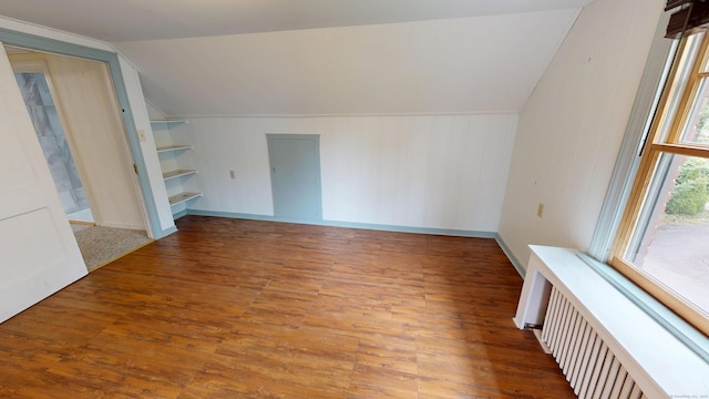 85 Hillcrest Ter, Meriden, CT 06450 - additional living space with lofted ceiling, built in features, wood finished floors, radiator heating unit, and baseboards