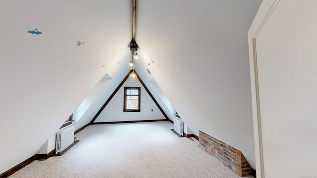 85 Hillcrest Ter, Meriden, CT 06450 - additional living space with vaulted ceiling, carpet flooring, radiator, and baseboards