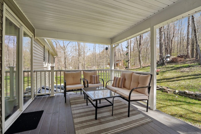 sunroom / solarium with an outdoor living space