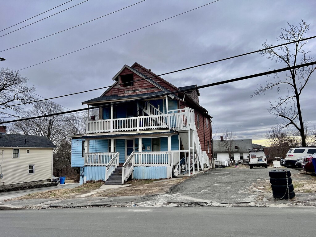 199 Hill St, Waterbury, CT 06704 - view of front of house with stairway and covered porch