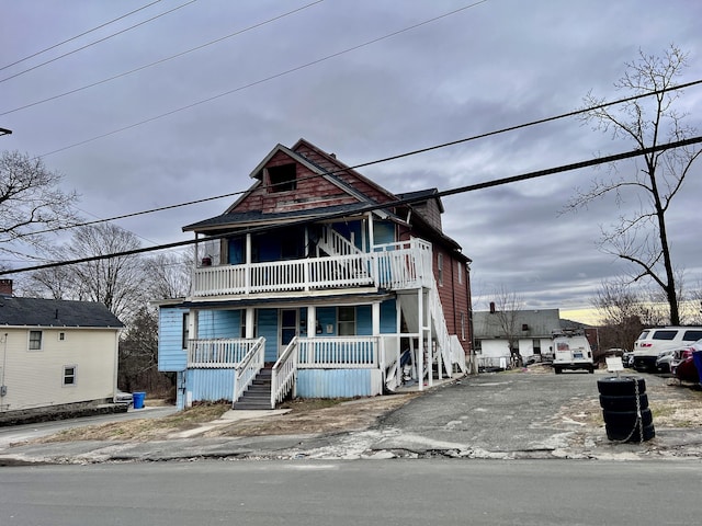 199 Hill St, Waterbury, CT 06704 - view of front of house with stairway and covered porch