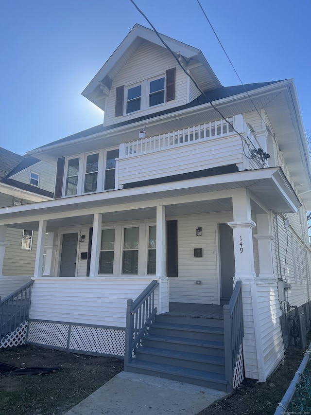 traditional style home with covered porch