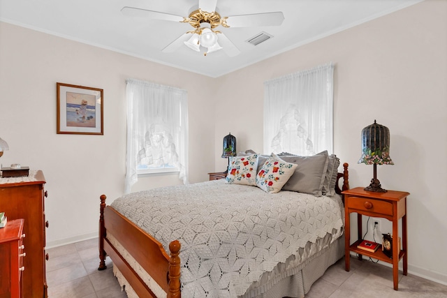 7 Parker Ln, Westbrook, CT 06498 - bedroom with light tile patterned floors, a ceiling fan, and crown molding