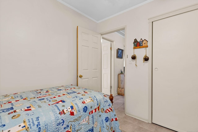 7 Parker Ln, Westbrook, CT 06498 - bedroom with ornamental molding, light tile patterned flooring, and a closet