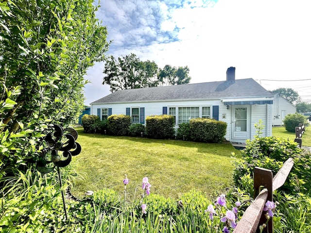 7 Parker Ln, Westbrook, CT 06498 - view of front of house with a front yard and a chimney