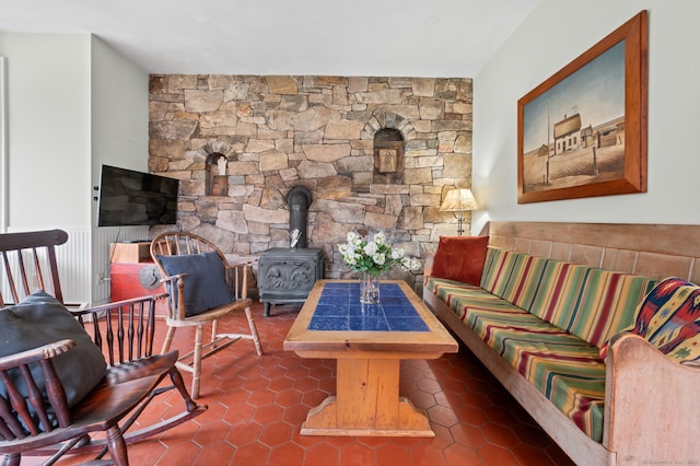 277 Milton Rd, Warren, CT 06756 - tiled living area featuring a wood stove