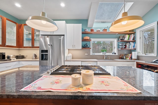277 Milton Rd, Warren, CT 06756 - kitchen with appliances with stainless steel finishes, open shelves, a sink, white cabinetry, and hanging light fixtures