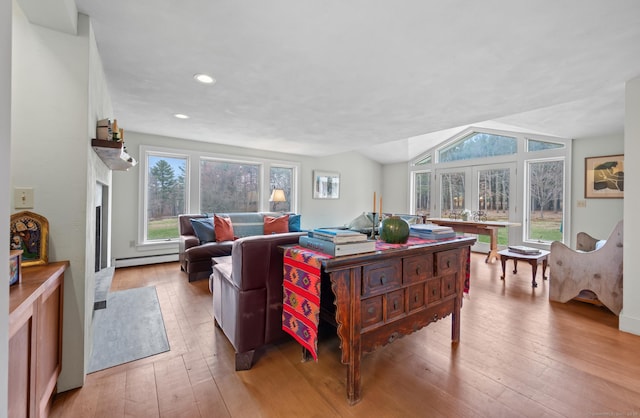 277 Milton Rd, Warren, CT 06756 - living area featuring baseboard heating, light wood-style flooring, healthy amount of natural light, lofted ceiling, and recessed lighting