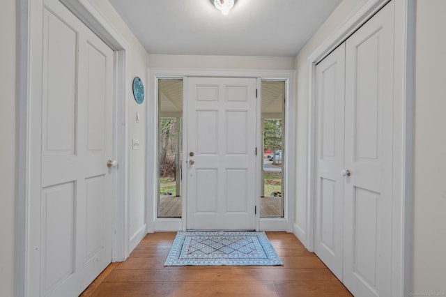 277 Milton Rd, Warren, CT 06756 - foyer entrance with light wood-style flooring and baseboards