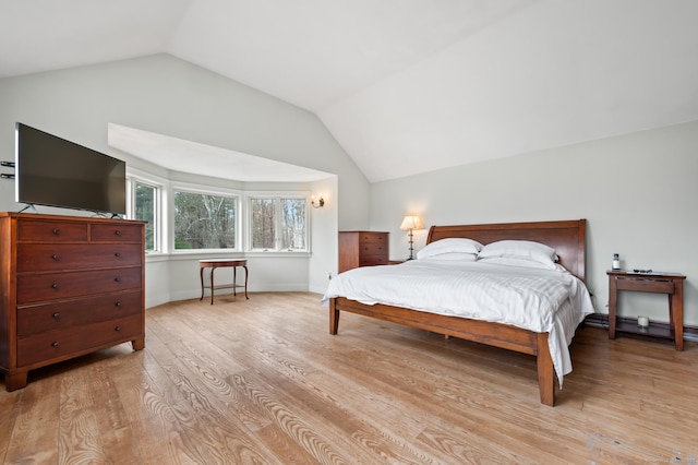 277 Milton Rd, Warren, CT 06756 - bedroom featuring vaulted ceiling, light wood-style floors, and baseboards