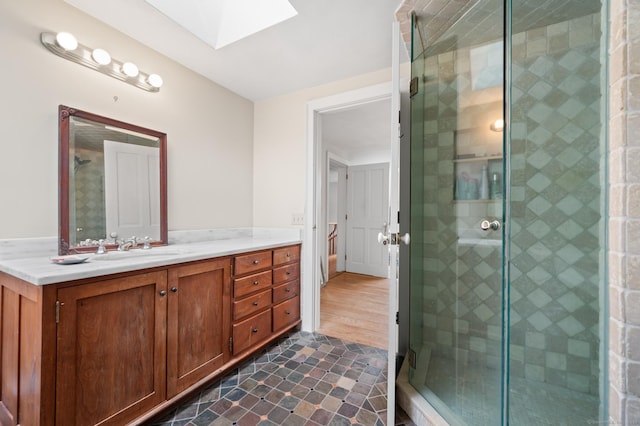 277 Milton Rd, Warren, CT 06756 - full bathroom with a skylight, a shower stall, and vanity