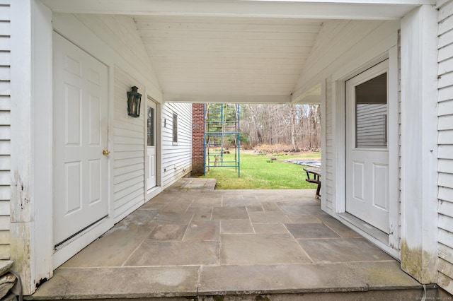 277 Milton Rd, Warren, CT 06756 - view of patio / terrace featuring an attached carport