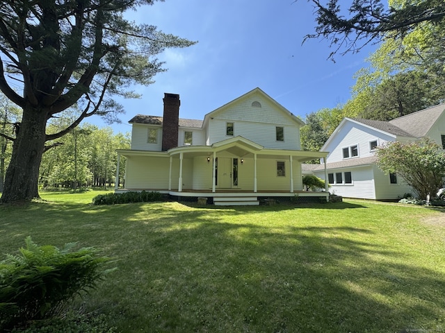 277 Milton Rd, Warren, CT 06756 - rear view of property with a chimney, a porch, and a lawn