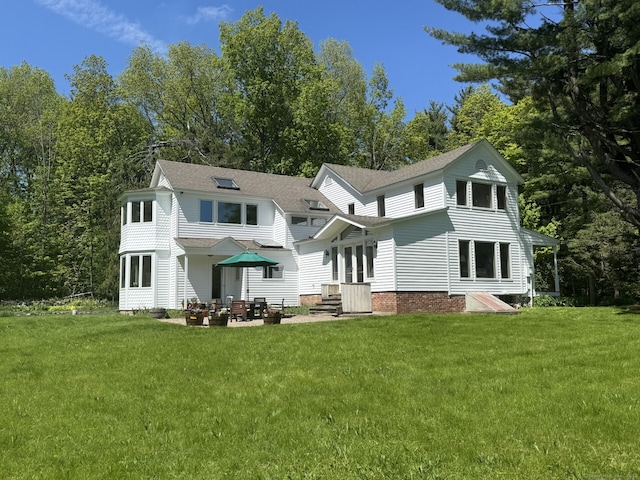 277 Milton Rd, Warren, CT 06756 - back of property with a lawn and a shingled roof