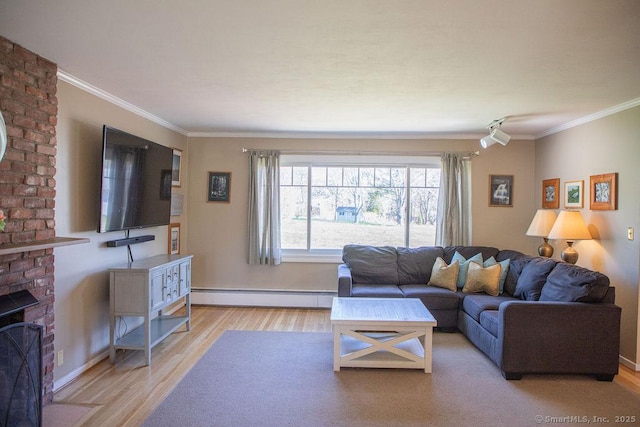 living area featuring light wood-style floors, ornamental molding, baseboards, and a baseboard radiator