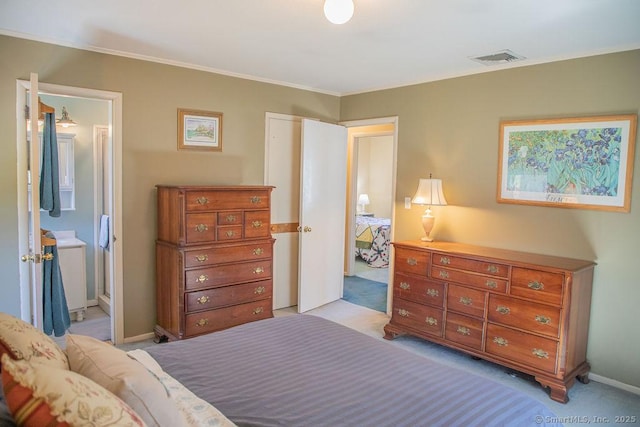 bedroom with light colored carpet, baseboards, visible vents, and ornamental molding