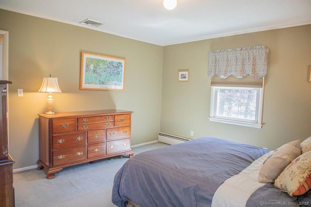 carpeted bedroom with baseboards, a baseboard heating unit, ornamental molding, and visible vents