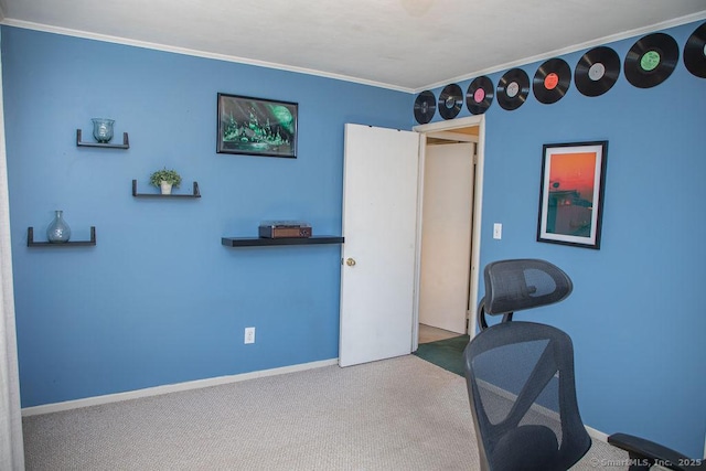 carpeted office with crown molding and baseboards