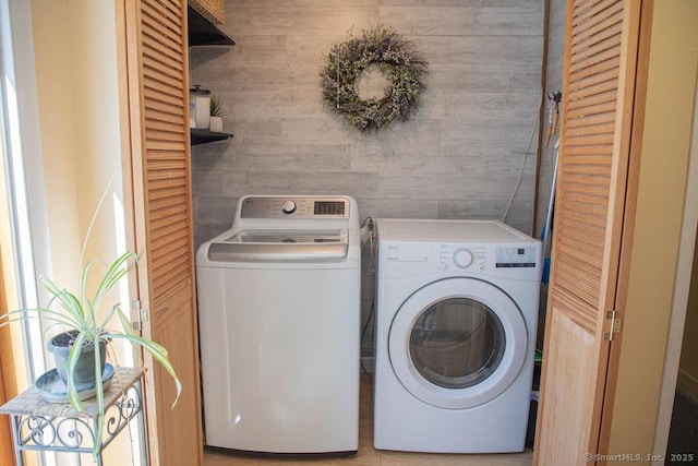 laundry area featuring laundry area and washer and clothes dryer