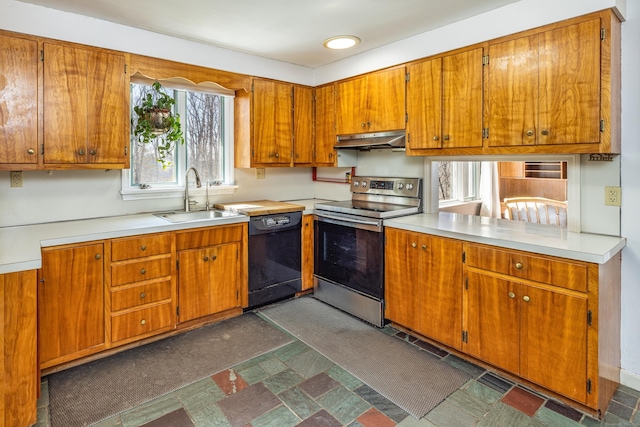 127 Separatist Rd, Mansfield, CT 06268 - kitchen with stainless steel electric stove, black dishwasher, a sink, under cabinet range hood, and light countertops