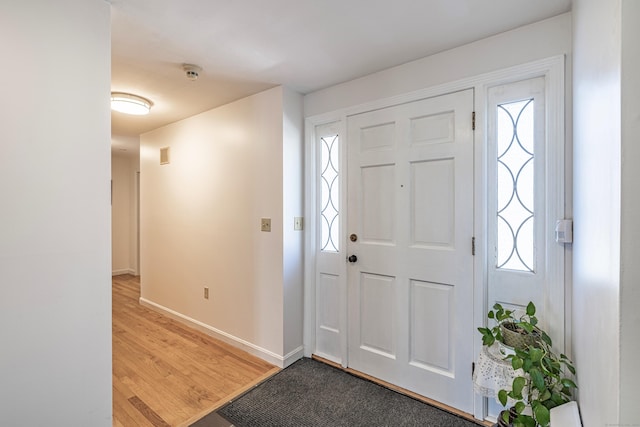 127 Separatist Rd, Mansfield, CT 06268 - entryway with light wood-style flooring, baseboards, and healthy amount of natural light