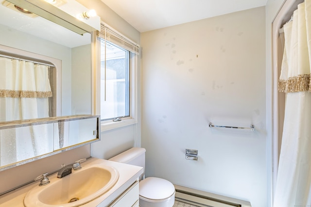 127 Separatist Rd, Mansfield, CT 06268 - full bathroom with baseboard heating, toilet, and vanity