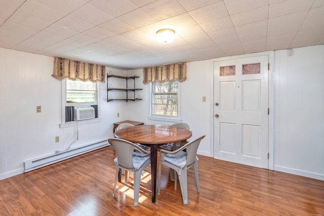 127 Separatist Rd, Mansfield, CT 06268 - dining room with baseboard heating, healthy amount of natural light, and wood finished floors
