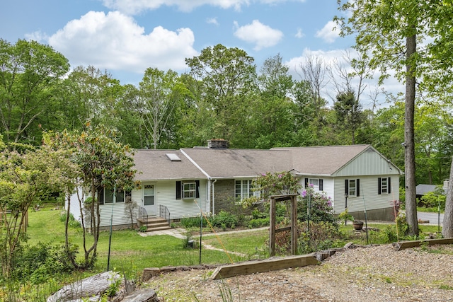 127 Separatist Rd, Mansfield, CT 06268 - view of front of home with a front yard, a chimney, and a shingled roof