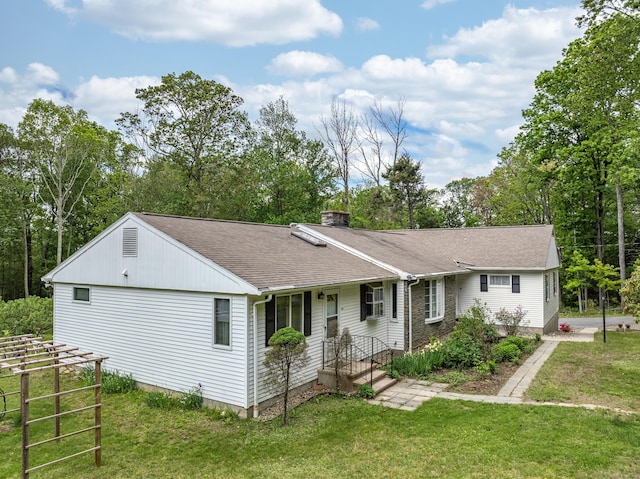 127 Separatist Rd, Mansfield, CT 06268 - single story home with a chimney, a front lawn, a shingled roof, and view of wooded area