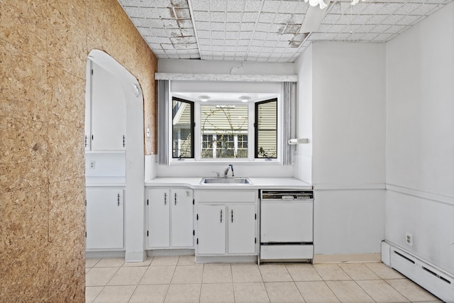 1228 Wells Pl, Stratford, CT 06615 - kitchen featuring a baseboard radiator, dishwasher, a sink, white cabinets, and light tile patterned flooring