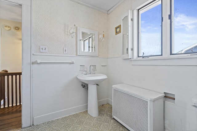 1228 Wells Pl, Stratford, CT 06615 - half bath with a wainscoted wall, radiator, tile patterned floors, crown molding, and toilet