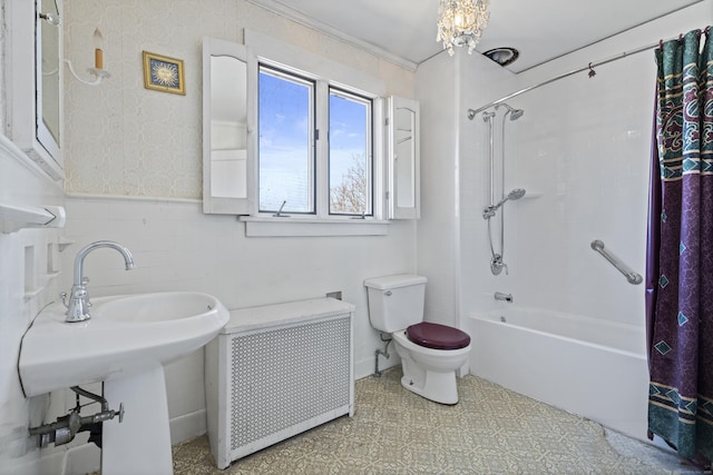 1228 Wells Pl, Stratford, CT 06615 - bathroom featuring radiator heating unit, toilet, a wainscoted wall, tile patterned floors, and tub / shower combination