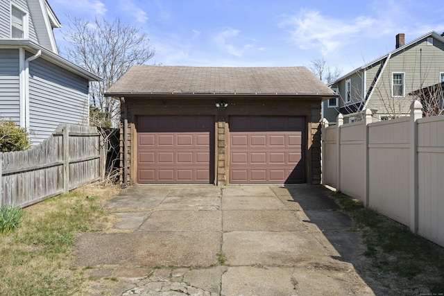 1228 Wells Pl, Stratford, CT 06615 - detached garage featuring fence