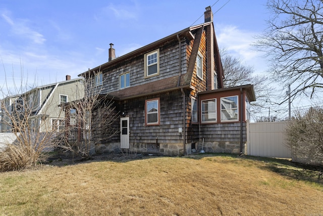1228 Wells Pl, Stratford, CT 06615 - rear view of house with a chimney