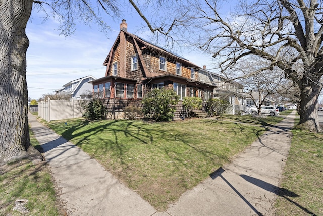 1228 Wells Pl, Stratford, CT 06615 - view of home's exterior with a chimney
