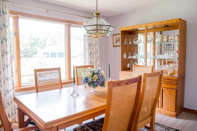 33 Oxford Dr, South Windsor, CT 06074 - dining space featuring a chandelier, plenty of natural light, and light wood-style floors
