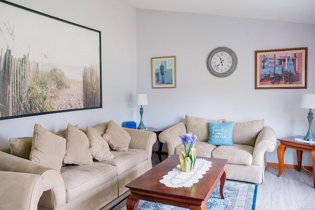 33 Oxford Dr, South Windsor, CT 06074 - living room with wood finished floors, baseboards, and lofted ceiling