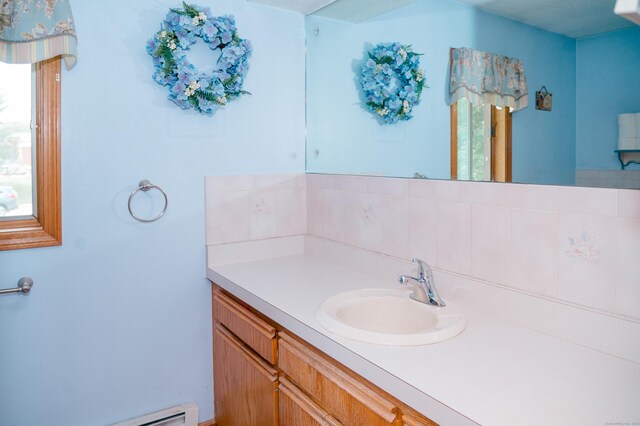 33 Oxford Dr, South Windsor, CT 06074 - bathroom featuring vanity and a baseboard radiator