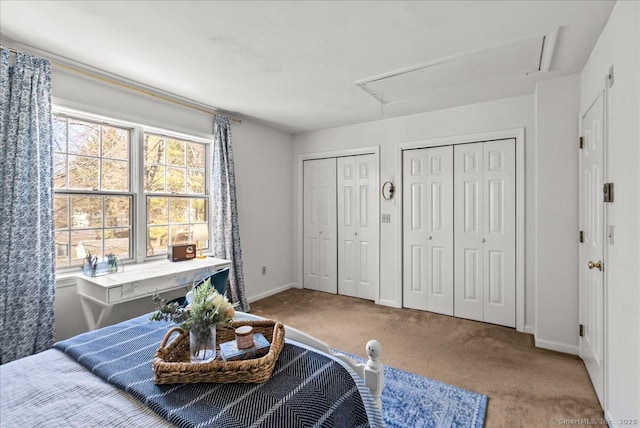 13 Brantwood Dr Unit 13, Madison, CT 06443 - bedroom featuring attic access, two closets, carpet floors, and baseboards