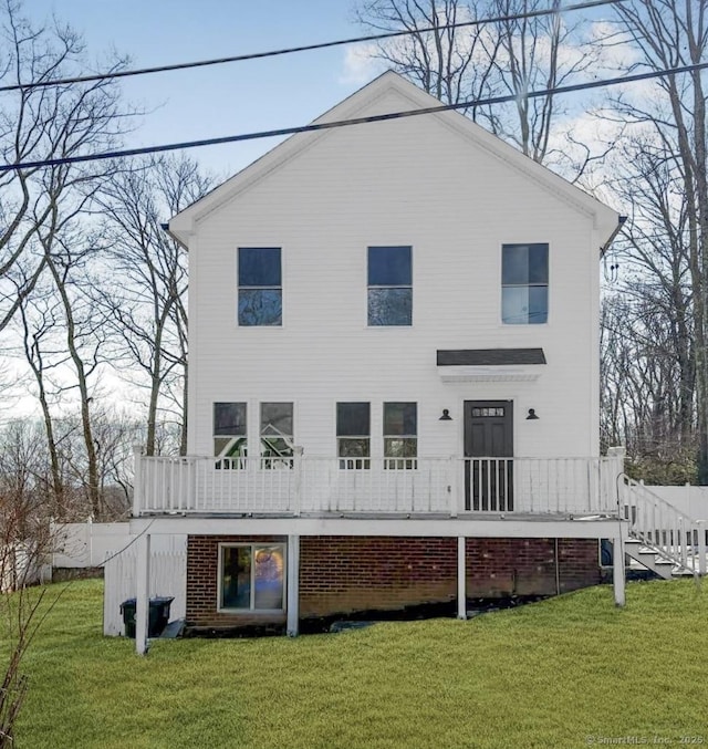 88 Walnut Trl, Danbury, CT 06810 - back of property featuring a yard, stairs, and a deck