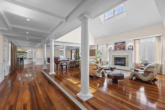 360 New London Tpke, Stonington, CT 06378 - living area featuring a tile fireplace, healthy amount of natural light, ornate columns, recessed lighting, and beam ceiling