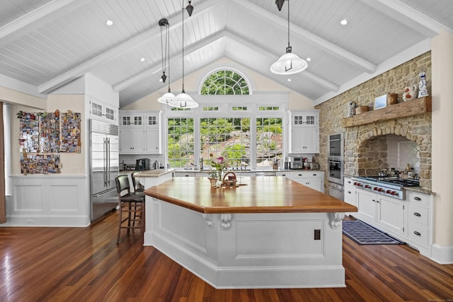 360 New London Tpke, Stonington, CT 06378 - kitchen with wood counters, stainless steel appliances, dark wood-style flooring, wainscoting, and wood ceiling