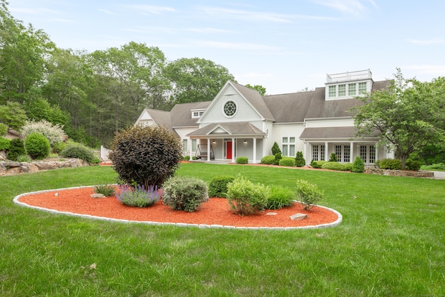 360 New London Tpke, Stonington, CT 06378 - view of front of home with a front lawn, french doors, a porch, and roof with shingles